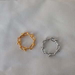 New and unworn fashion rings, plated silver, about a size 9